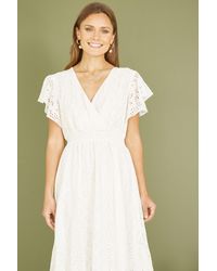 Yumi' - Cotton Broderie Anglaise Wrap Midi Dress - Lyst