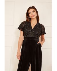 Yumi' - Sequin Embellished Velvet Jumpsuit With Angel Sleeves - Lyst