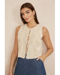 Yumi' - Knitted Tie Front Waistcoat With Floral Details - Lyst