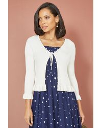 Yumi' - Ivory Tie Up Ribbed Cardigan With Frill Hem - Lyst