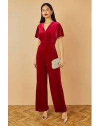 Yumi' - Jumpsuit With Angel Sleeves - Lyst