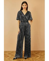 Yumi' - Metallic Pleated Jumpsuit With V Neck - Lyst