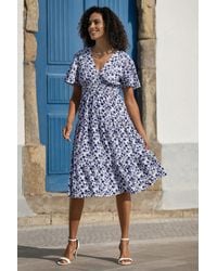 Yumi' - Floral Ruched Waist Midi Dress With Angel Sleeves - Lyst
