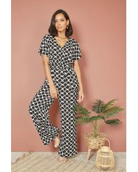 Yumi' - Geometric Print Wrap Jumpsuit - Lyst