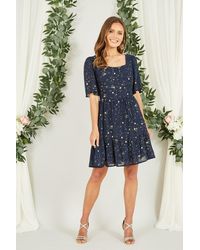 Yumi' - Star Print Skater Dress - Lyst