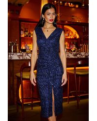 Yumi' - Sequin Fitted Wrap Dress With Split Hem - Lyst