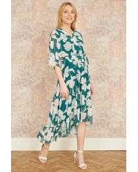 Yumi' - Kimono Sleeves Midi Dip Hem Wrap Midi Dress - Lyst