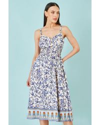 Yumi' - Floral Border Print Viscose Midi Sun Dress - Lyst