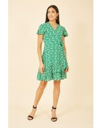 Yumi' - Ditsy Floral Wrap Frill Dress - Lyst