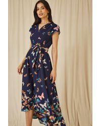 Yumi' - Butterfly Print Dip Hem Midi Wrap Dress - Lyst