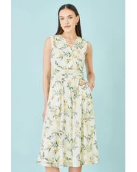 Yumi' - Floral Print Mesh Stretch Midi Dress With Pockets - Lyst