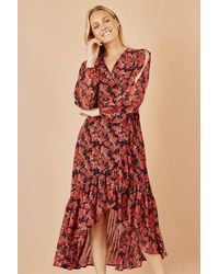 Yumi' - Rose Print Dipped Hemline Midi Dress With Open Long Sleeves - Lyst