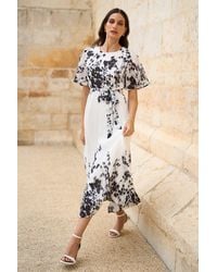 Yumi' - Mirror Floral Design Pleated Midi Dress - Lyst