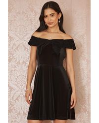 Mela - Velvet Skater Dress With Sparkle Bow Neckline - Lyst