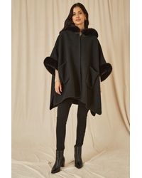 Yumi' - Cape With Luxe Fur Trim And Lining - Lyst