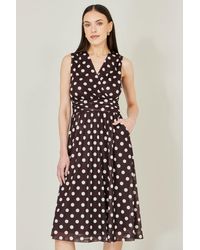 Yumi' - Polka Dot Mesh Wrap Skater Dress With Pockets - Lyst