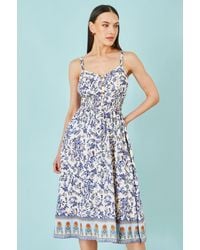 Yumi' - Floral Border Print Viscose Midi Sun Dress - Lyst