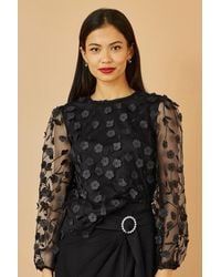 Yumi' - Sheer Sleeve Applique Flower Top - Lyst
