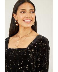 Yumi' - Star Foil Print Long Sleeve Skater Dress - Lyst