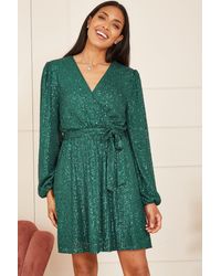 Mela - Sequin Belted Wrap Long Sleeve Dress - Lyst
