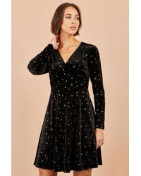 Yumi' - Velvet Skater Dress With Foil Star Print - Lyst