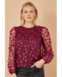 Yumi' - Sheer Sleeve Applique Flower Top - Lyst