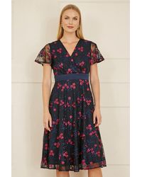 Yumi' - Embroidered Floral Mesh Wrap Midi Skater Dress - Lyst