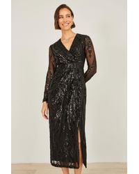 Yumi' - Sequin Midi Wrap Dress With Split Hemline And Long Sleeves - Lyst