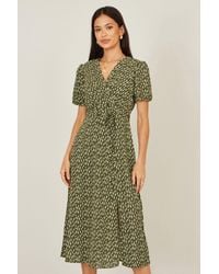 Yumi' - Spot Wrap Midi Tea Dress - Lyst