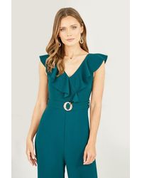 Mela London - Mela Jumpsuit With Buckle And Frill Detail - Lyst
