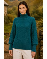 Yumi' - Cable Knit Roll Neck Jumper - Lyst