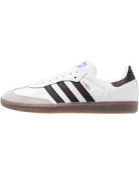 adidas originals outloud samba rose trainers in leopard print