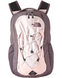 grey and pink north face backpack