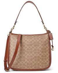 COACH - Coated Canvas Signature Cary Shoulder Bag (Tan Rust) Handbags - Lyst