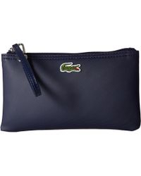 lacoste virtual pink clutch bag