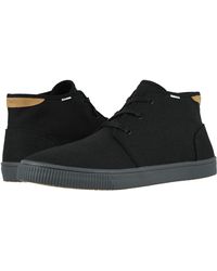 toms black high tops