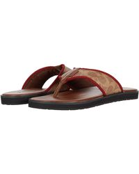 coach signature flip flops