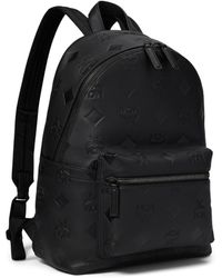 MCM - Stark Emblem Maxi Monogrammed Leather Backpack - Lyst