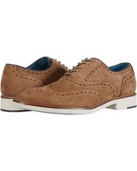 johnston & murphy cody wing tip zip boot