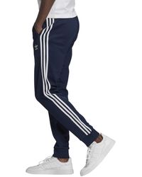adidas originals superstar cuffed jogger in navy br4288