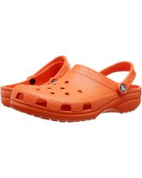 all terrain crocs tan