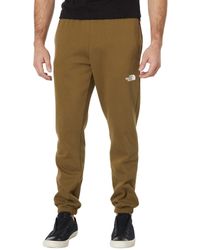 khaki green north face joggers