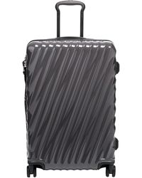 tumi spinner