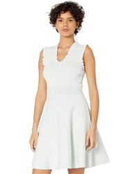 mizalia highland wrap detail skater dress