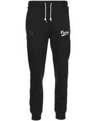 PUMA Track pants and sweatpants for 