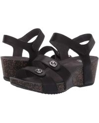 dansko black wedge sandals