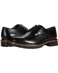 johnston & murphy cody wing tip zip boot