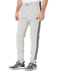 essentials fleece tapered cuff 3 stripes