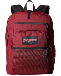 red jansport big student backpack