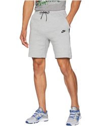 white nike tech shorts